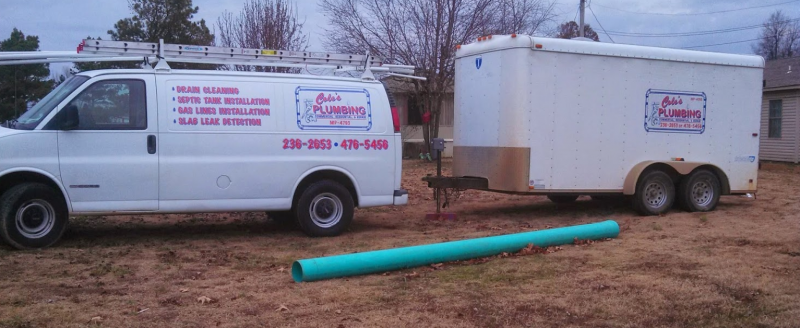 Cole's Plumbing & Excavation work truck at a job